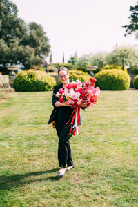 Melanie Senior Wedding Manager with Bouquet