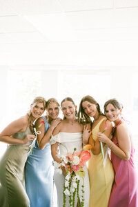 bridesmaids in colorful pastel dresses, funky retro vintage bride