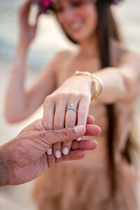 Hawaii engagement photos showing off ring, taken by Hawaii Adventure Portraits