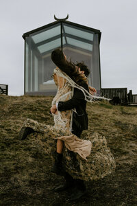 groom holding bride