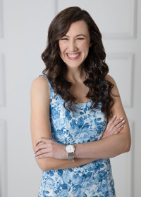 luxury cape cod wedding photographer meghan lynch smiling at the camera