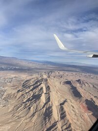 Airplane view over nevada mountains by Tonaya Noel Photography