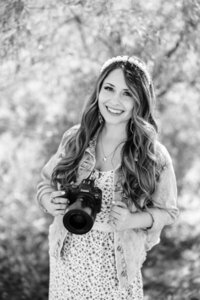 Photographer reviewing her branding for creatives with Palme Design Co