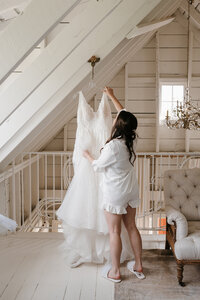 wedding photo of a bride getting ready taken by a minneota wedding photographer