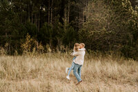 Duluth Minnesota Fall Engagement Photoshoot on the Beach and in Pine Trees