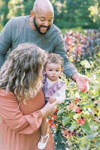 richmond family in a garden with baby