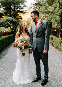 newlyweds looking at each other after ceremony.