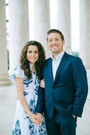 Bride and groom walk up memorial steps at their DC wedding