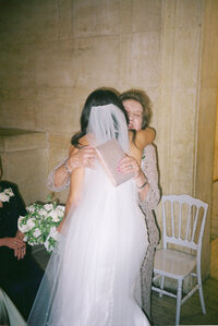bride hugging