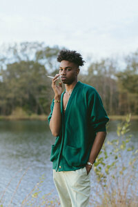 man standing outside in nature