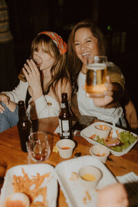 two women smiling at the camera