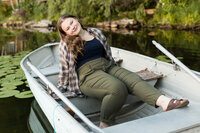 Girl sitting in a row boat