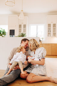 newborn photography with a couple and their baby girl