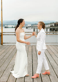 Bride and Bride holding hands organized by seattle wedding planners