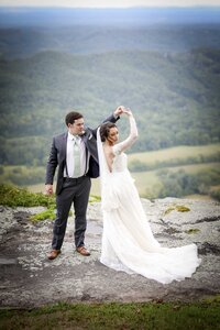 South Carolina bride and groom dancing in the hills