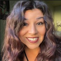 Woman with wavy hair smiling