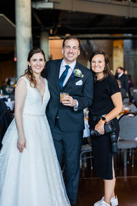 Eleanor Stenner with bride and groom at Birmingham wedding 