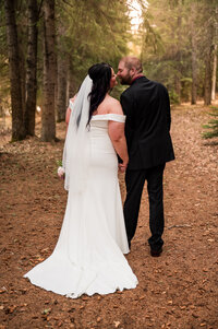 Outdoor wedding portraits in Rocky Mountain House photographed by travelling Edmonton Wedding Photographer