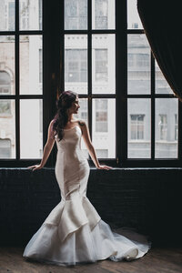 strapless mermaid wedding dress with a petal hem