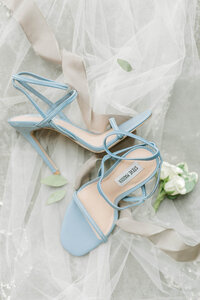 light blue wedding shoes styled nicely non top of veil