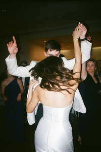 bride and groom dancing