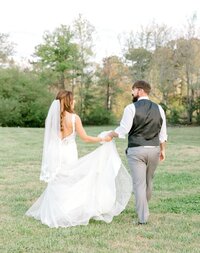 Bride and groom walk up memorial steps at their DC wedding