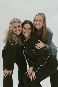 three women smiling