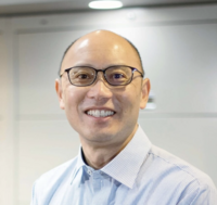 Headshot of owner of The Healing Den- Stephanie E. smiling