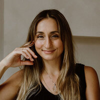 Headshot of Natalie Kehren, psychic medium, energetics specialist, and course creator, sharing testimonial for Moonstone Creative branding services