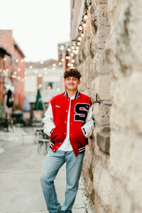 Urban senior portrait captured in St. Paul, blending modern cityscapes with personal style to create a memorable senior photo