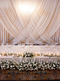 Reception table with flowers taken by photographers in chicago Allison Francois photography