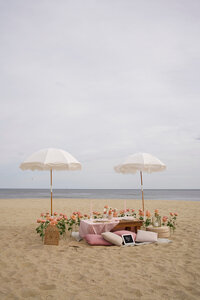 beach proposal set up Styled by Yours Truly, a wedding planner and designer in New Jersey.