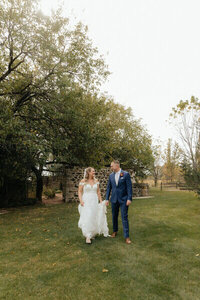 Image of bride and groom looking at each other by Wisconsin Wedding Planner team, Dream Weddings