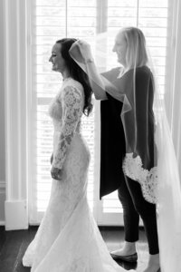 Elyse Jennings puts veil on bride