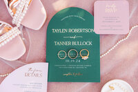 Elegant wedding invitation suite featuring stunning rings and accessories, beautifully styled for a Colorado wedding, showcasing wedding details at the Denver Botanical Gardens.