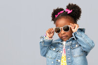 Vibrant Back-to-School Portrait | Sassy Girl on Red Background by Ashlie Steinau Photography in Wallingford, CT. Capturing Personality and Style.