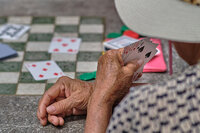 A lady playing cards
