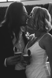 A candid moment with a newlywed couple after their intimate wedding ceremony.