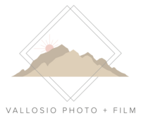 Tan mountains with blush sun and interlaced grey diamond logo