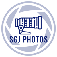 The logo for SGJ Photos is a line drawing of a large lens in the center of a stylized camera shutter iris.
