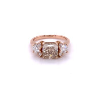 champagne diamond engagement ring in rose gold  with white diamond side stones