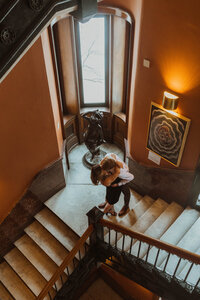 A modern, classy winter engagement session in Minneapolis, Minnesota exploring  the halls of a historical  landmark center