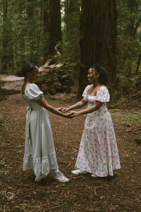California Redwoods Engagement Photos of Lesbian couple in the woods after their proposal.