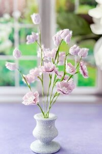 purple delphinium sugar flowers in a vase
