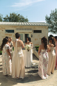 Bridesmaids in soft colored dresses at wedding planned and designed by Everlasting Events 
