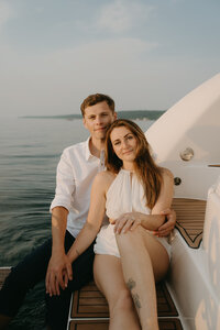 couples photoshoot on a boat in Lake Michigan