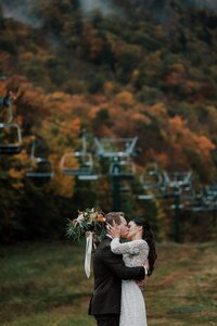 fall vermont elopement bride an d groom kissing