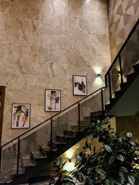 Beautiful open stairway with black iron railing