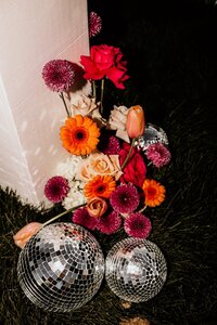 disco ball with colorful wedding flowers