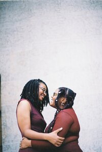 newly wed couple hugging, candid wedding photography